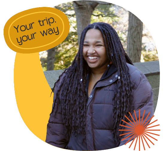 A person with long plaits wearing a brown jacket smiles outdoors. Text reads "Science trips Iceland—your trip, your way" with a yellow background and an orange sun graphic.