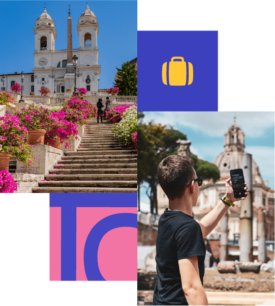 A man takes a selfie with his mobile in front of historic buildings; above, steps lined with flowers lead to a white church with two towers under a blue sky.